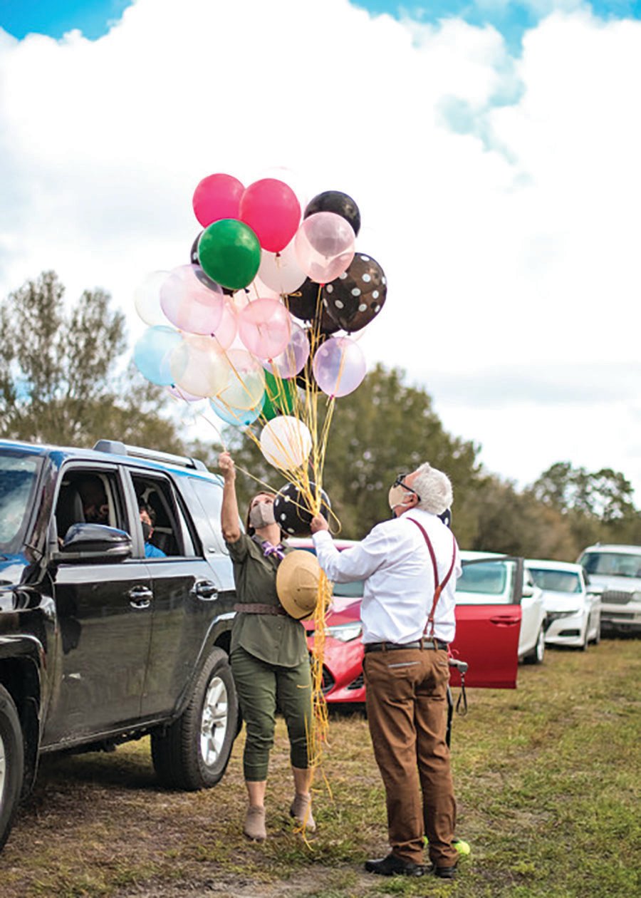 This year Ellie and Carl Fredricksen join the festival’s Disney cast to give out balloons to all the cars waiting in line.